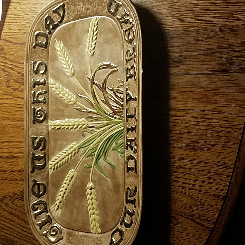 Ceramic religious plate brown and beige